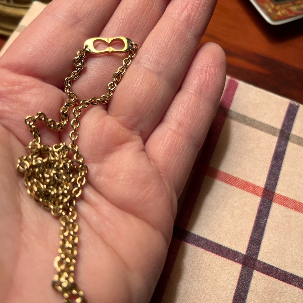 Coach signature gold earrings and matching necklace